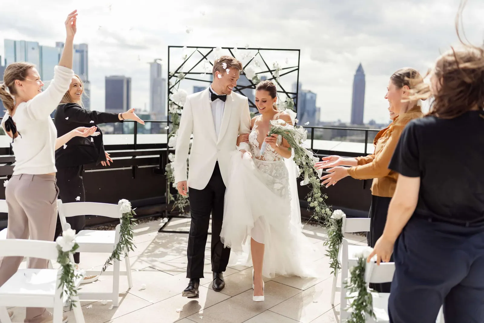 The bride and groom on a rooftop terrace in Frankfurt after the wedding ceremony